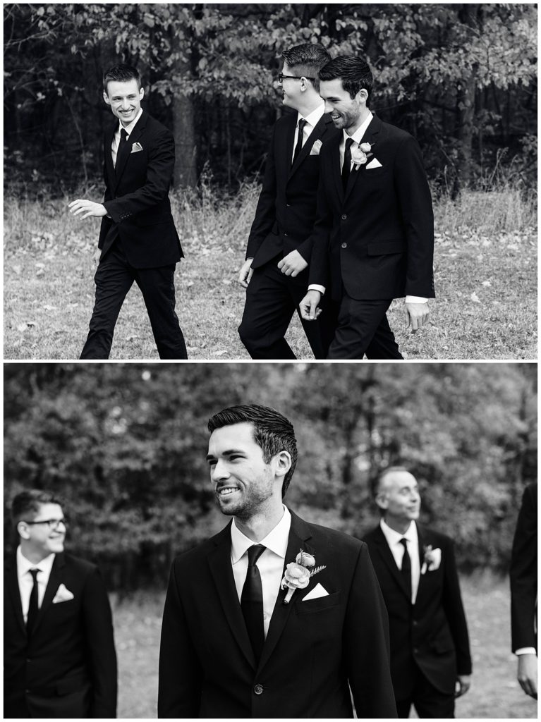 Groomsmen walking and laughing candidly for a photo before the wedding ceremony.