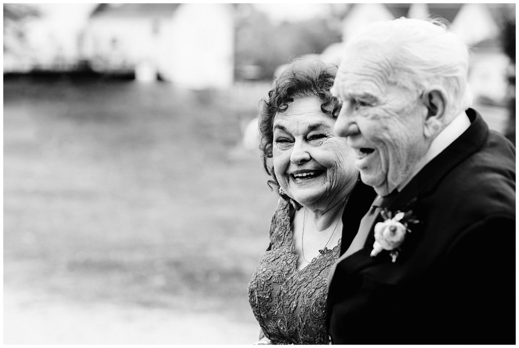 Grandma of the groom is shown smiling full of happiness at her grandsons wedding in detroit michigan. Photo taken right after the wedding ceremony which took place in michigan.