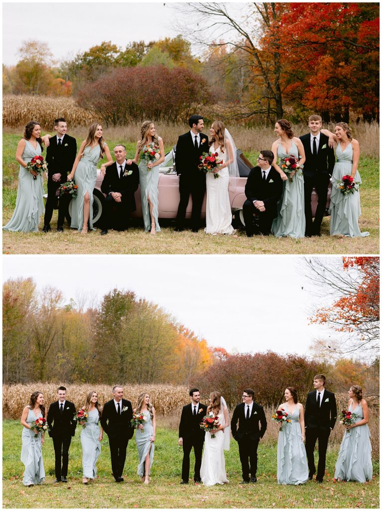 wedding party pose for photos at reception in detroit michigan at private estate with fall leaves and beautiful scenery