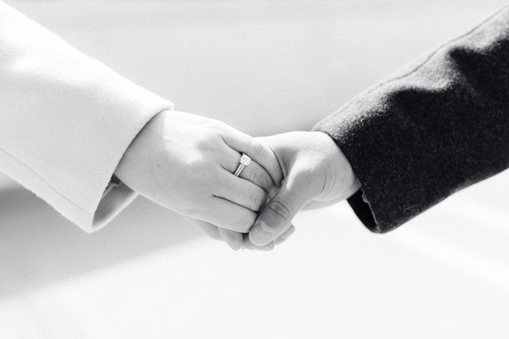 engaged couple holds hand detroit engagement